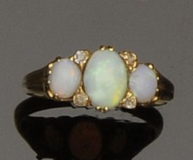An opal and diamond ring