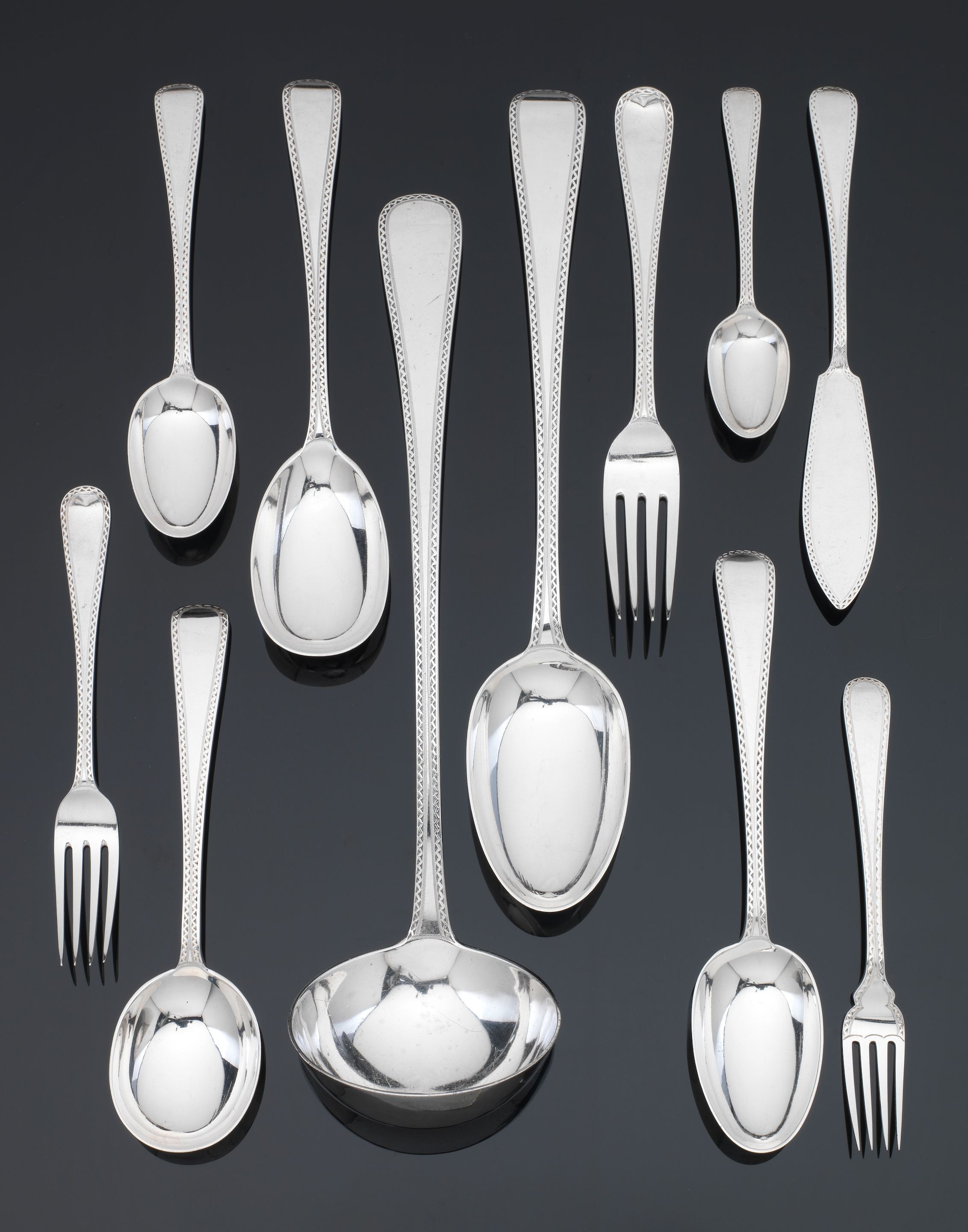 Bonhams A silver Old English brightcut pattern part table service of