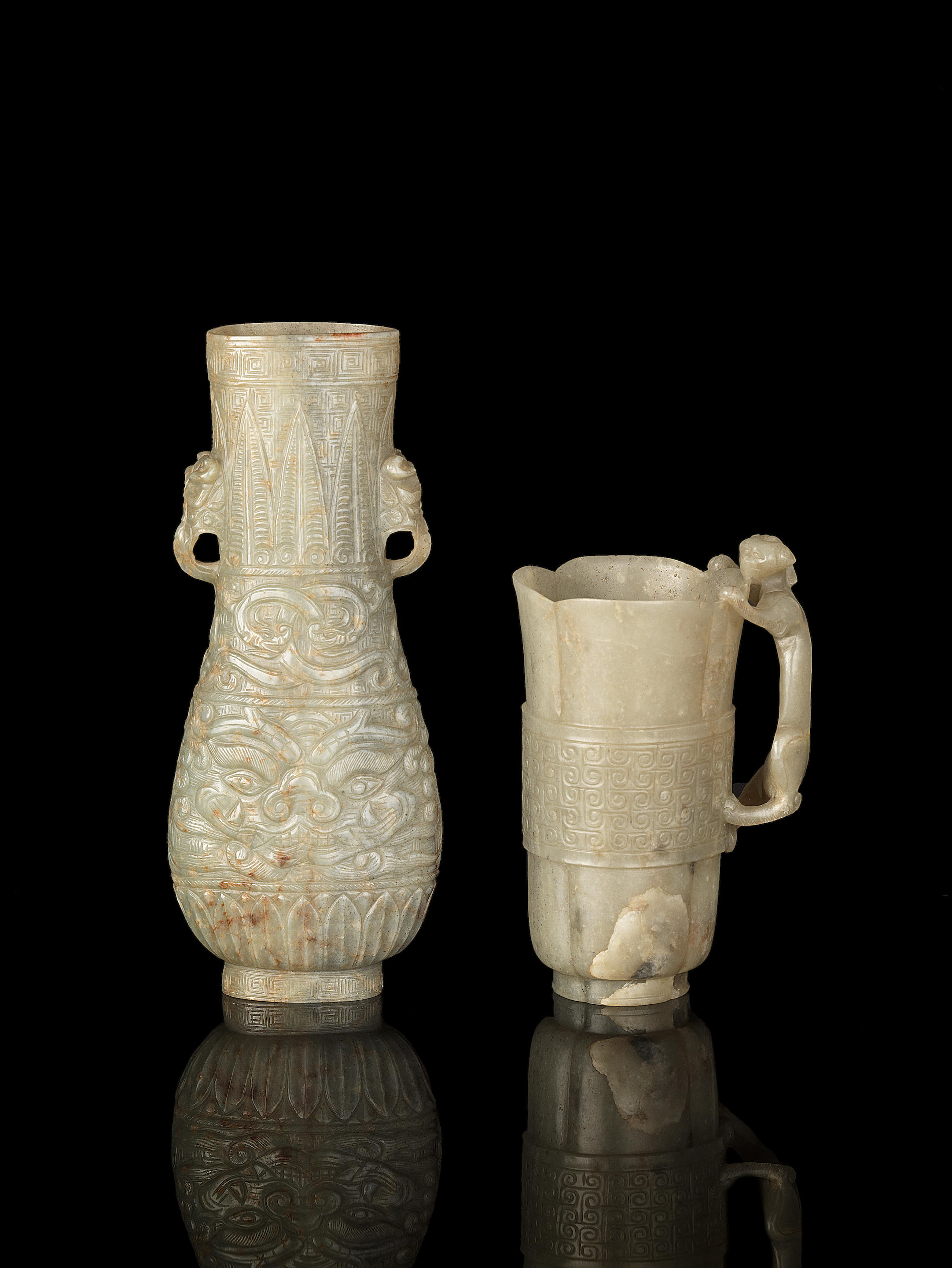 Bonhams : A pale green jade foliate cup and an archaistic jade hu ...