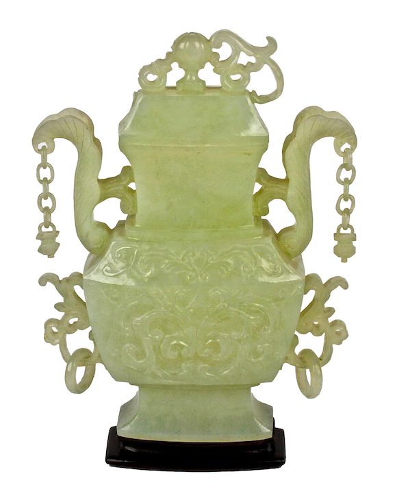 Bonhams A pale green jade vase and cover, 20th century