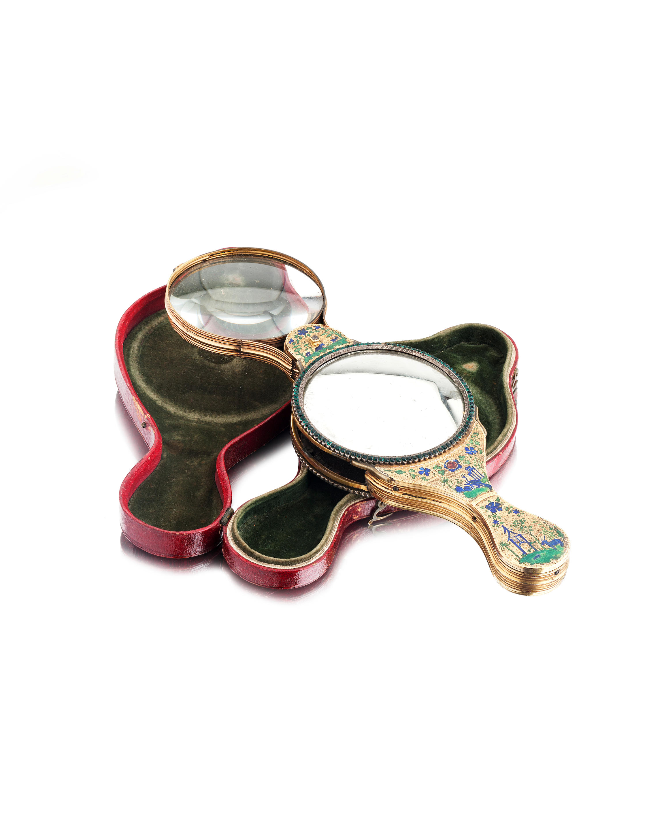 Sold at Auction: A SMALL BRASS MAGNIFYING GLASS on a stand.