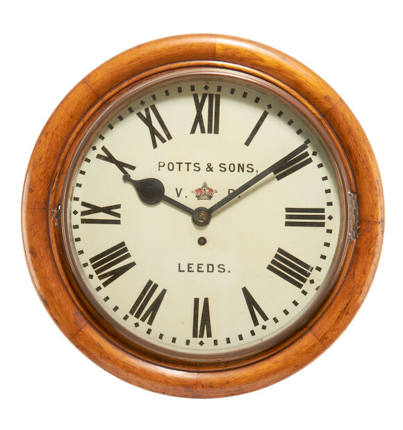 Bonhams : A 19th century oak post office timepiecesigned Potts & Sons ...