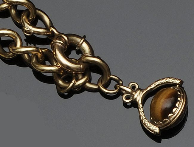 A 9ct gold solid curb-link bracelet