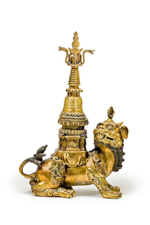 Bonhams : A gilt-bronze Tibetan mythical beast carrying a stupa 18th ...