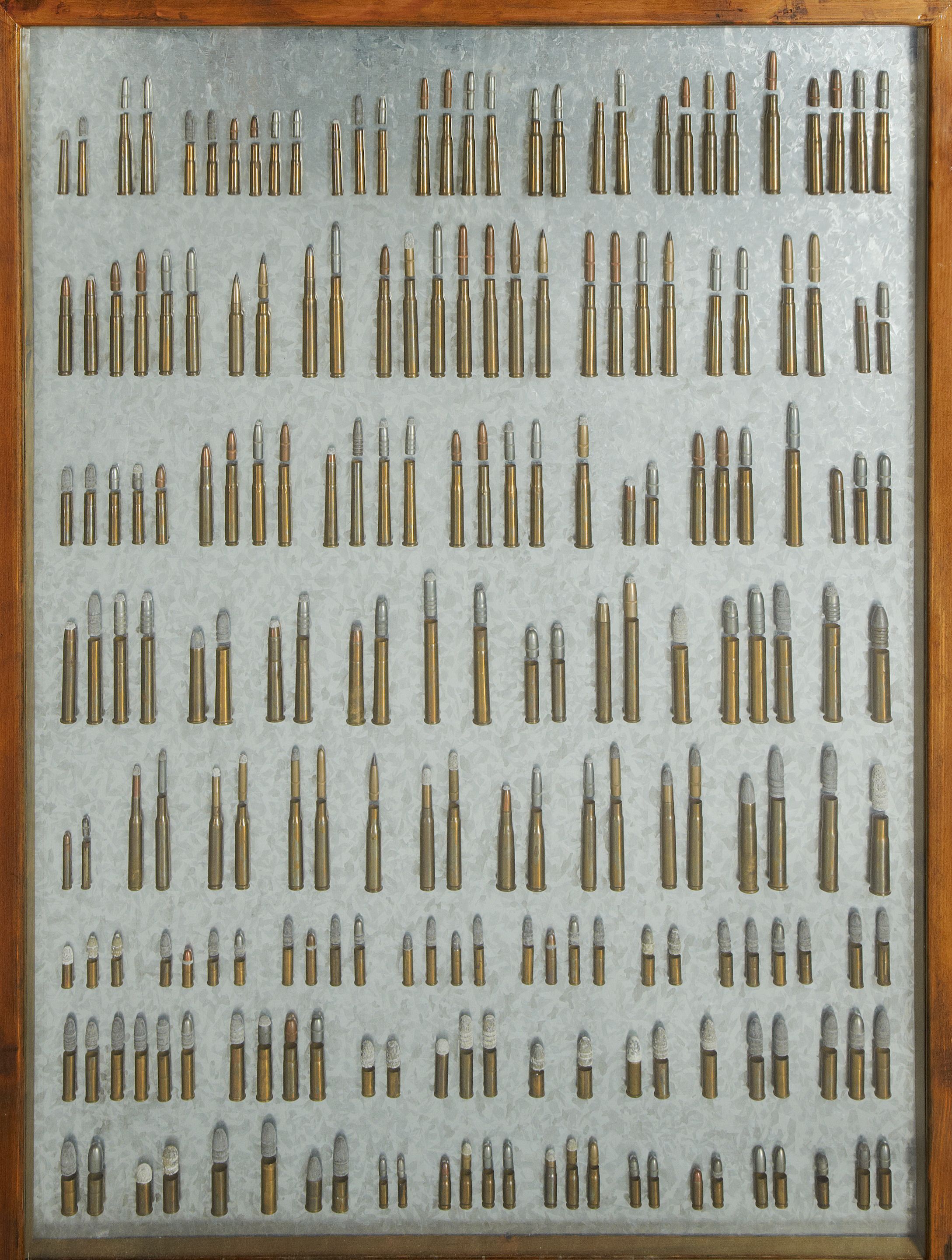 Bonhams : An unusual cartridge-display board of Remington cartridges
