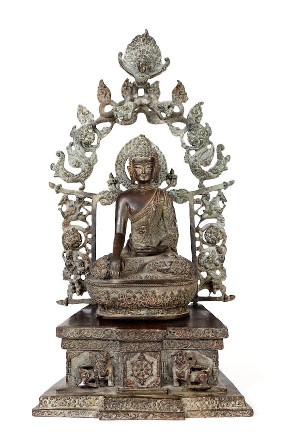 Bonhams : A Sino-Tibetan bronze figure of Buddah on a throne