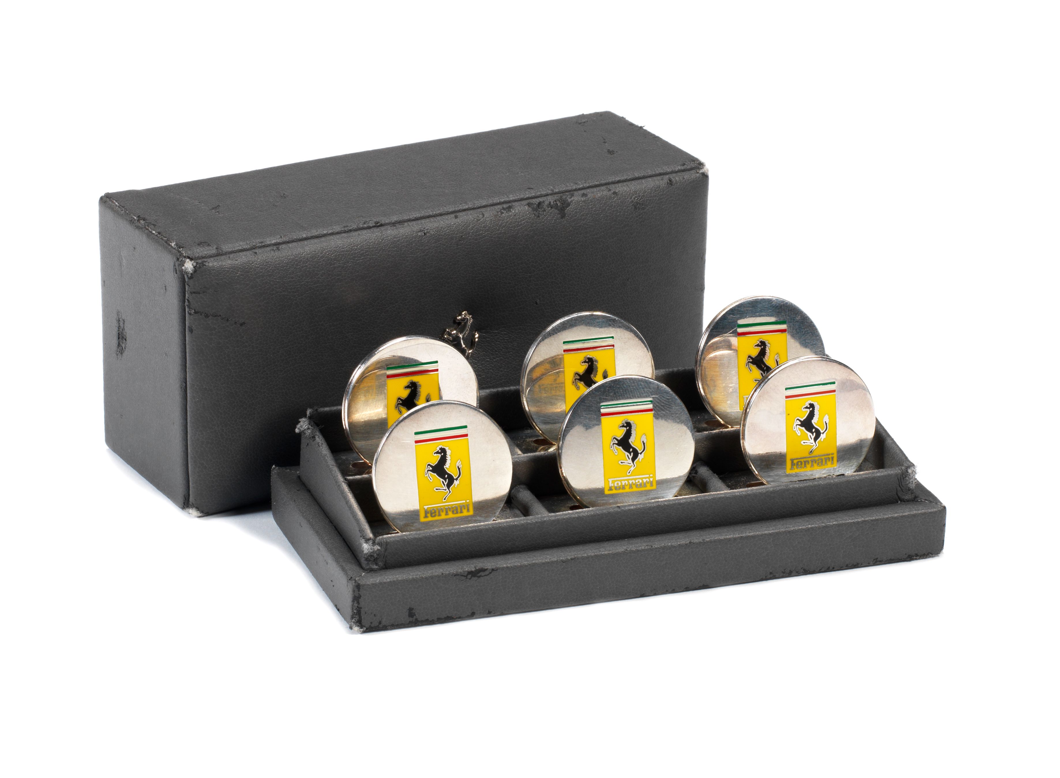 Bonhams Cars : A cased set of six silver Ferrari menu/place card holders,