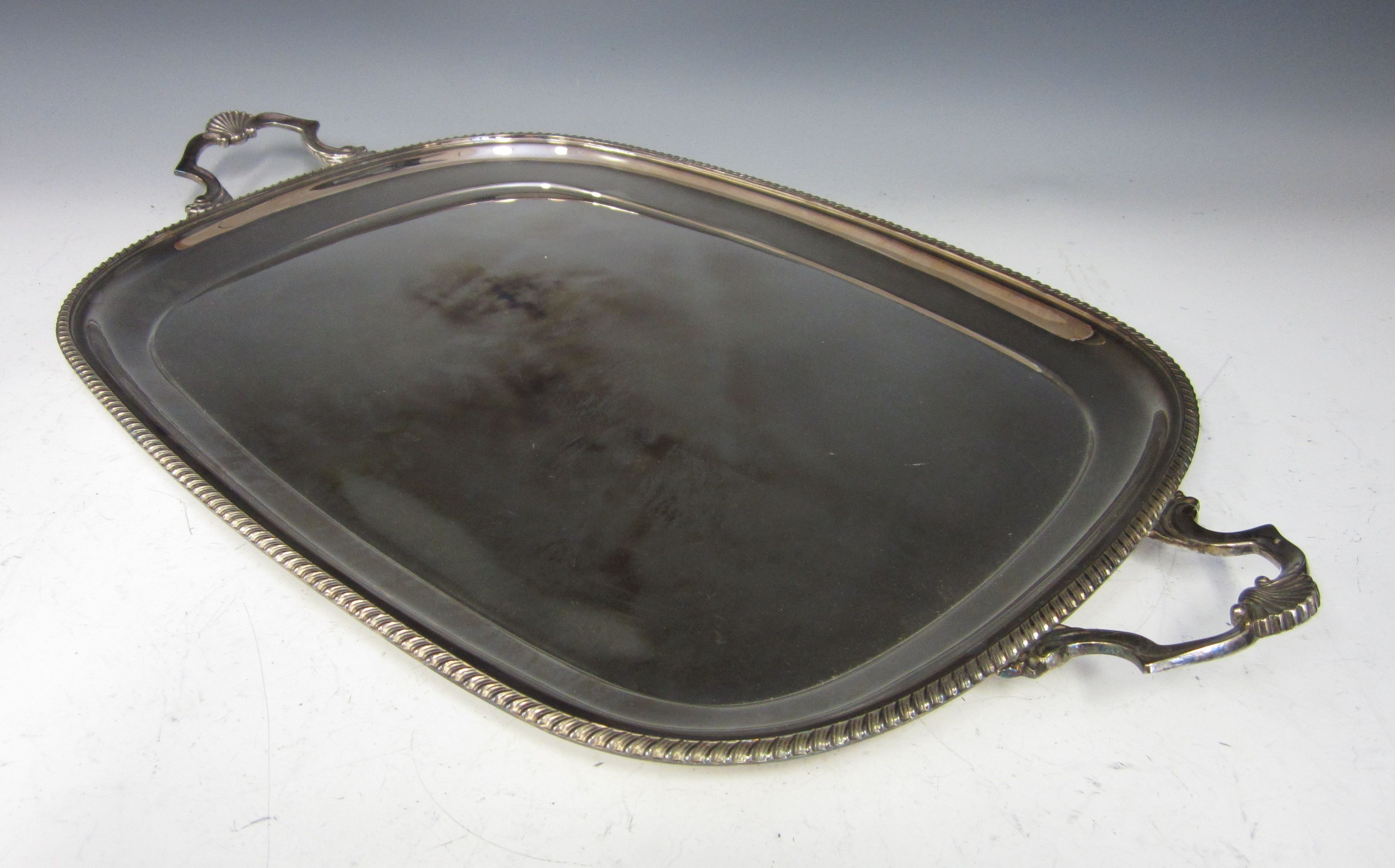 A silver two handled rectangular tray Birmingham 1977