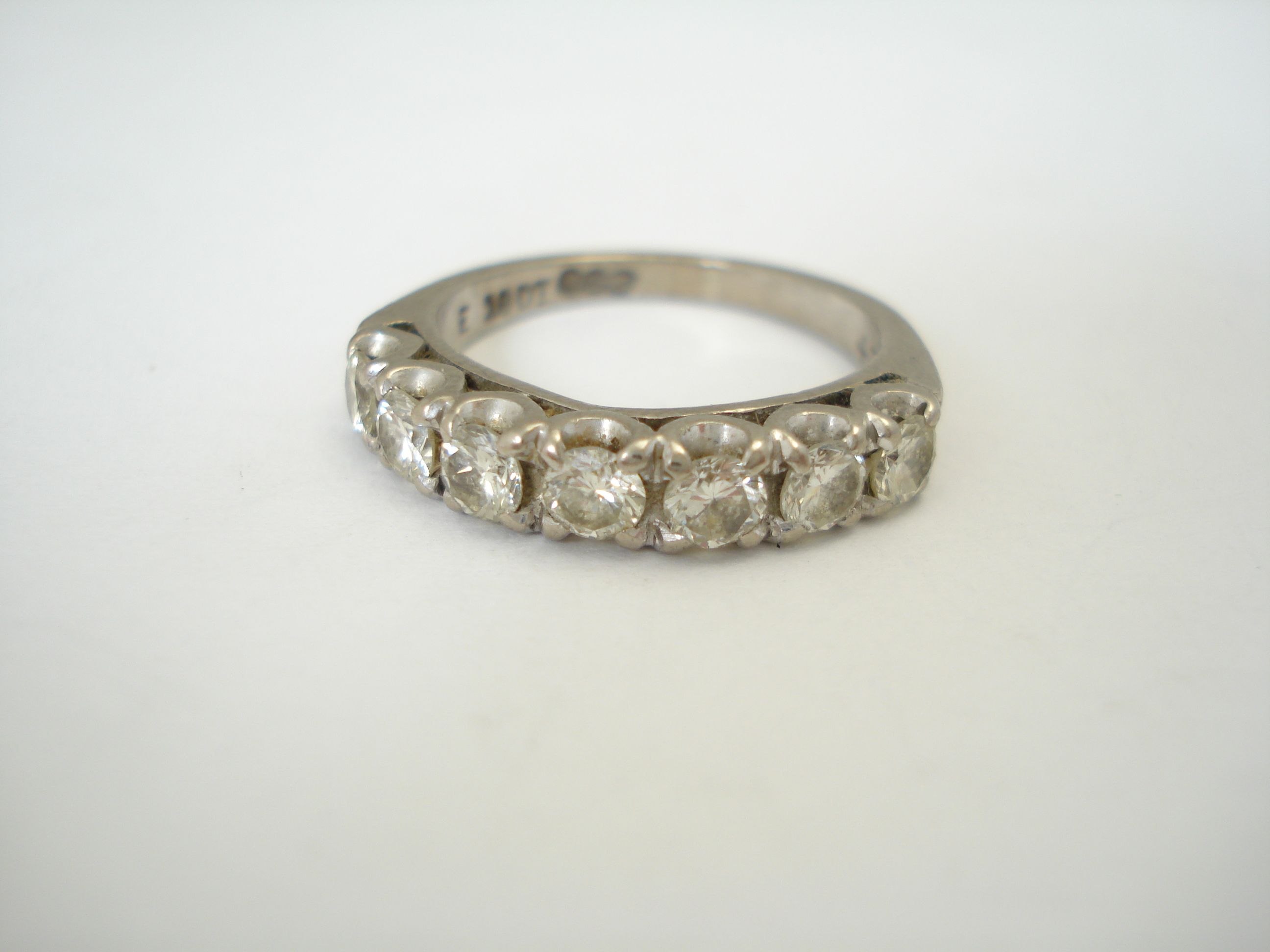 A diamond half eternity ring