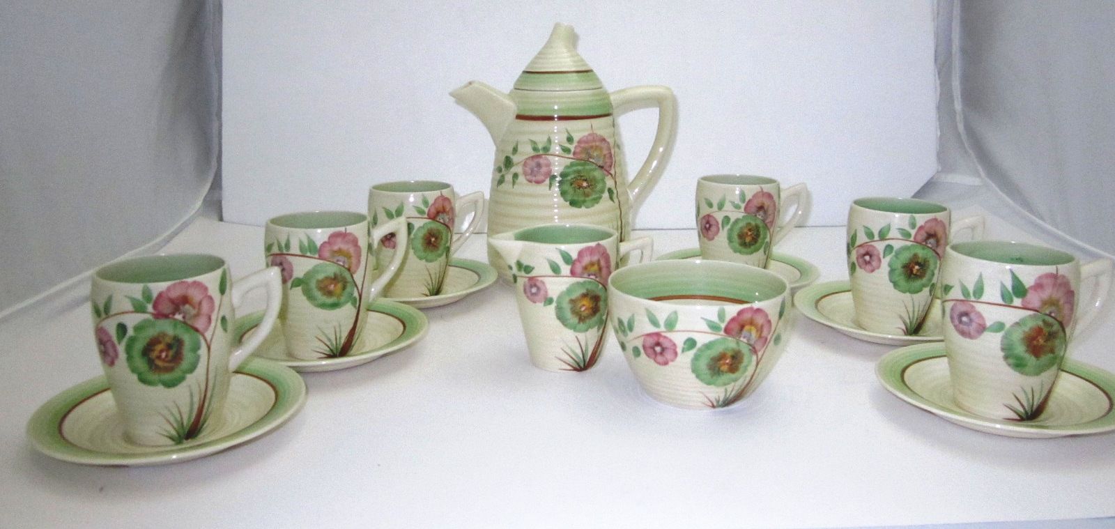Bonhams A Clarice Cliff 'Honeydew' Lynton coffee set