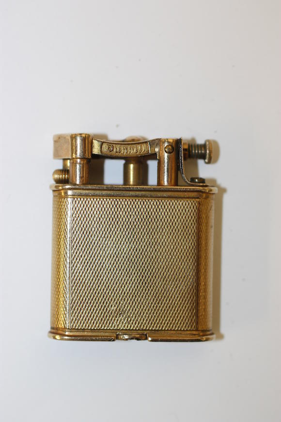 Bonhams : Dunhill A 9ct gold lighter,