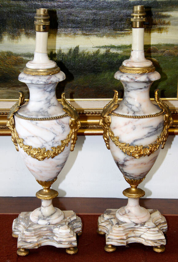 Bonhams : A pair of early 20th Century gilt metal mounted veined marble ...