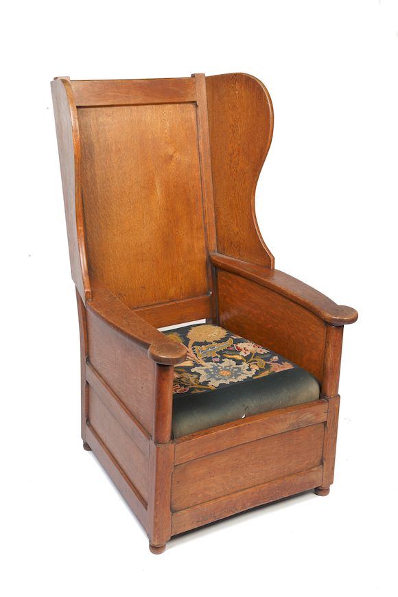 Bonhams A late Victorian/Edwardian oak lambing chair,