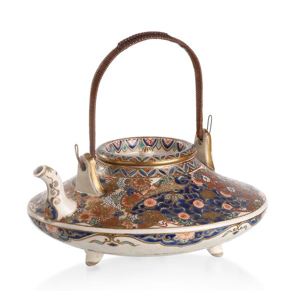 Bonhams A Japanese Satsuma sake pot Marked 'Satsuma yaki' and the