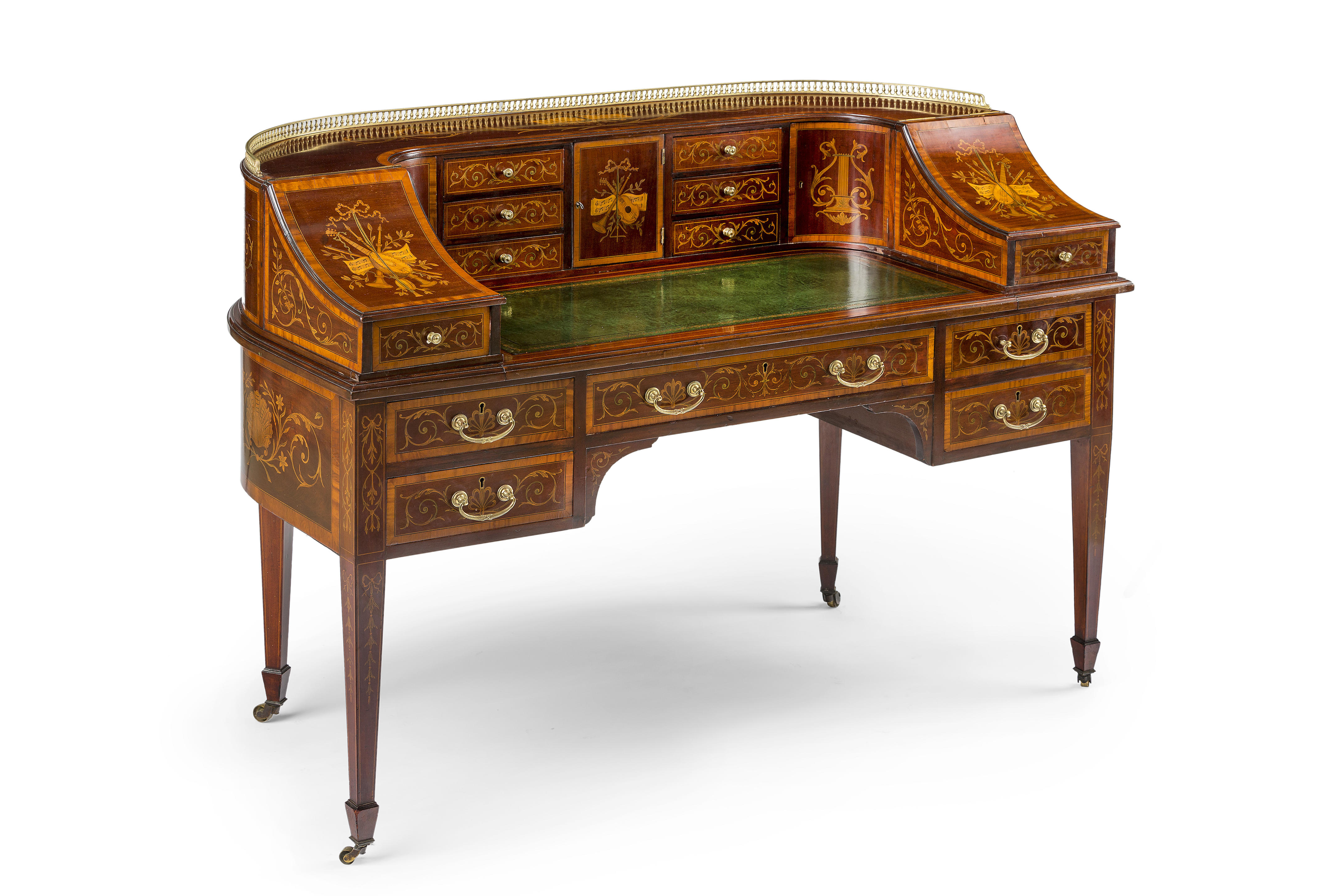 A fine Victorian inlaid mahogany and satinwood Carlton House desk