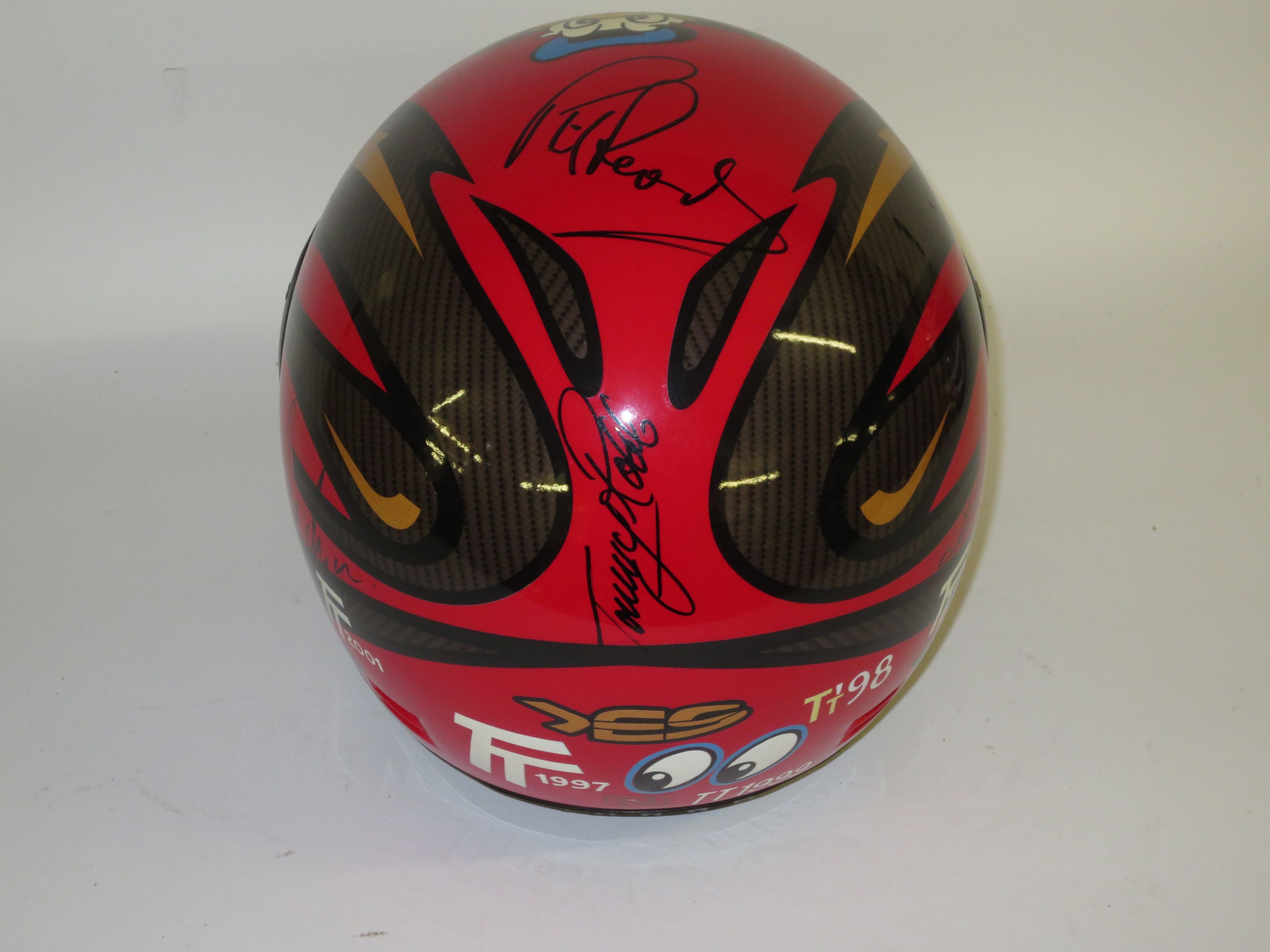 Bonhams Cars : A TT 2002 commemorative helmet signed by various riders,