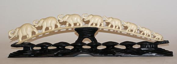 Bonhams : A Chinese ivory carving of a procession of eight elephants ...