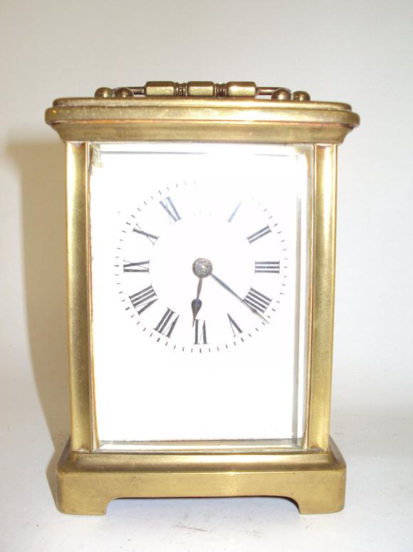 Bonhams : A brass carriage clock