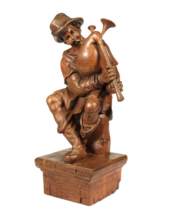 Bonhams : A Flemish 18th century carved oak figure of a bagpipe ...
