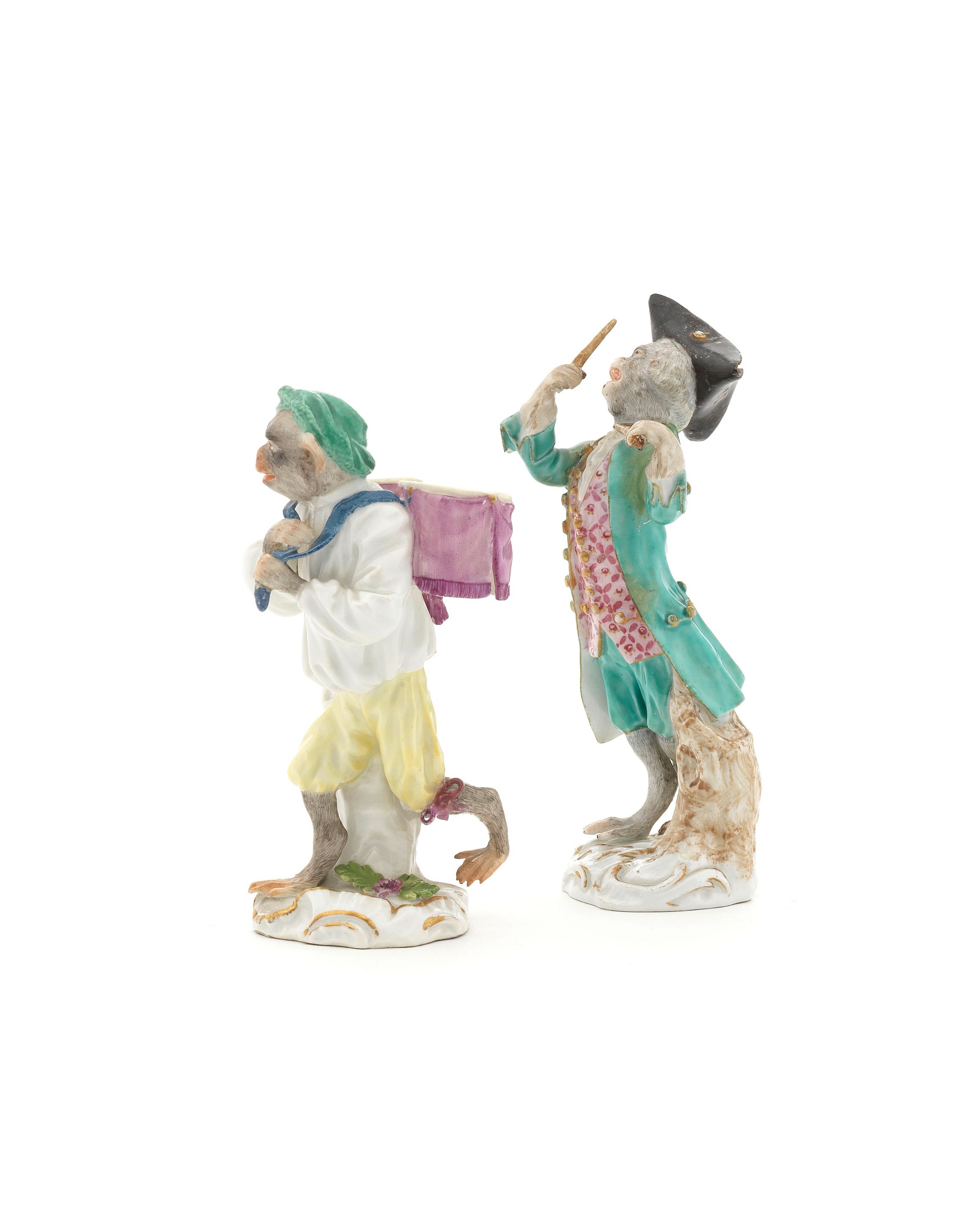 Bonhams Two Meissen monkey band figures of a drummer and drumbearer