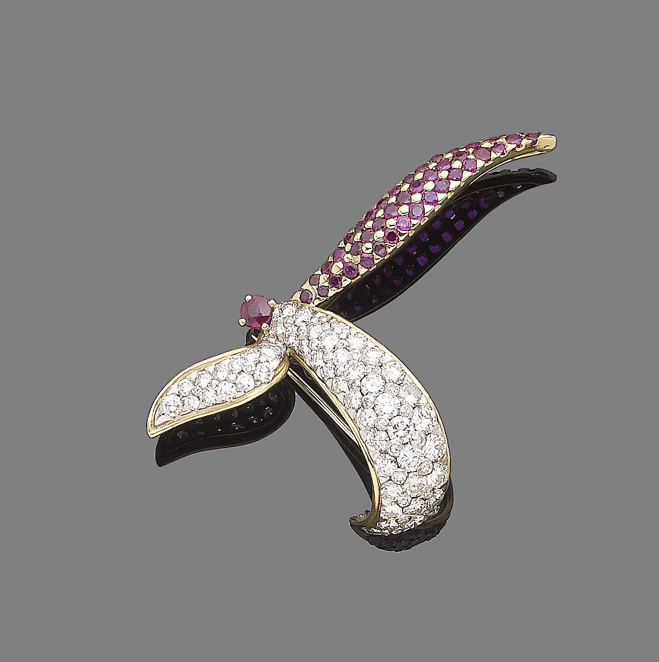 A ruby and diamond flower brooch