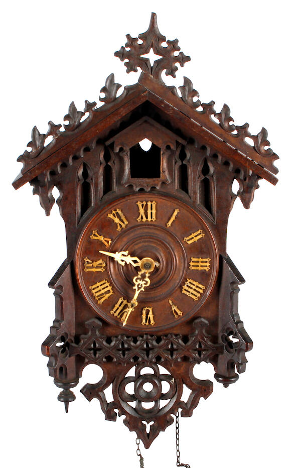 Bonhams A Bavarian carved walnut cuckoo clock