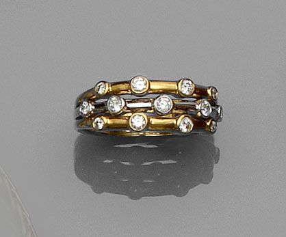 A diamond half hoop ring