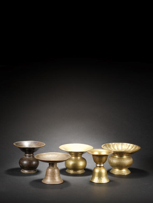 Bonhams : Five small brass Spittoons India, 16th-18th Century(5)