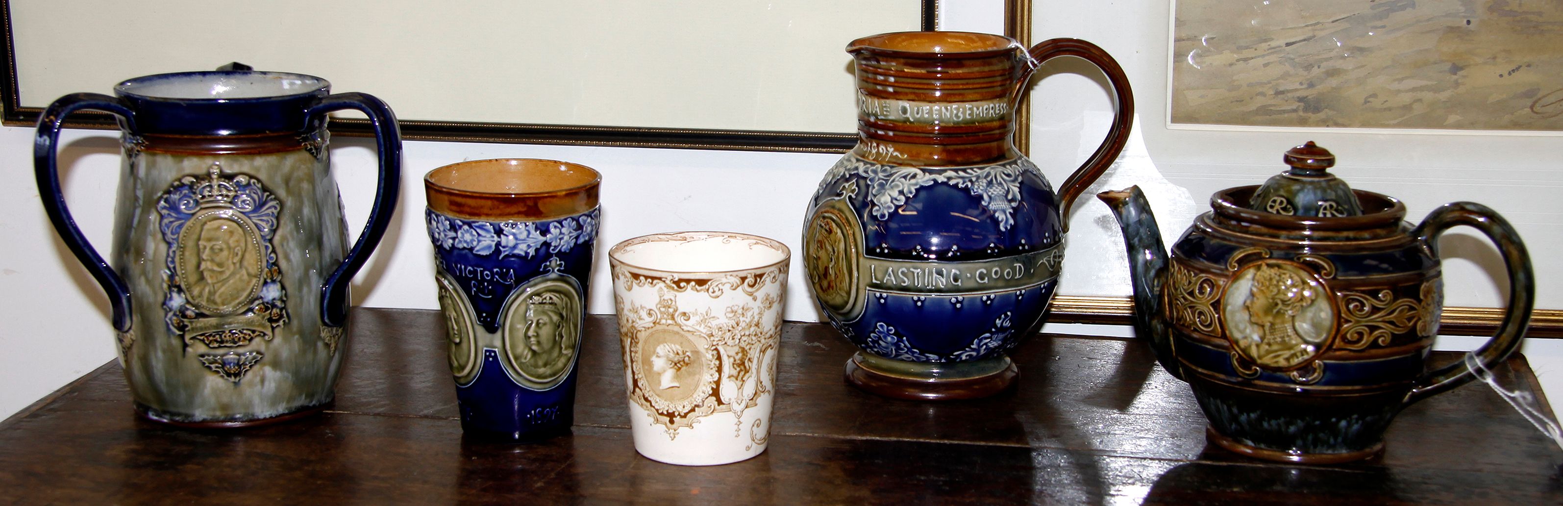 Bonhams Four Royal Doulton Lambeth stoneware commemorative pieces and