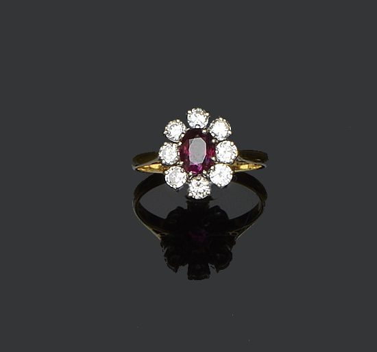 A ruby and diamond cluster ring