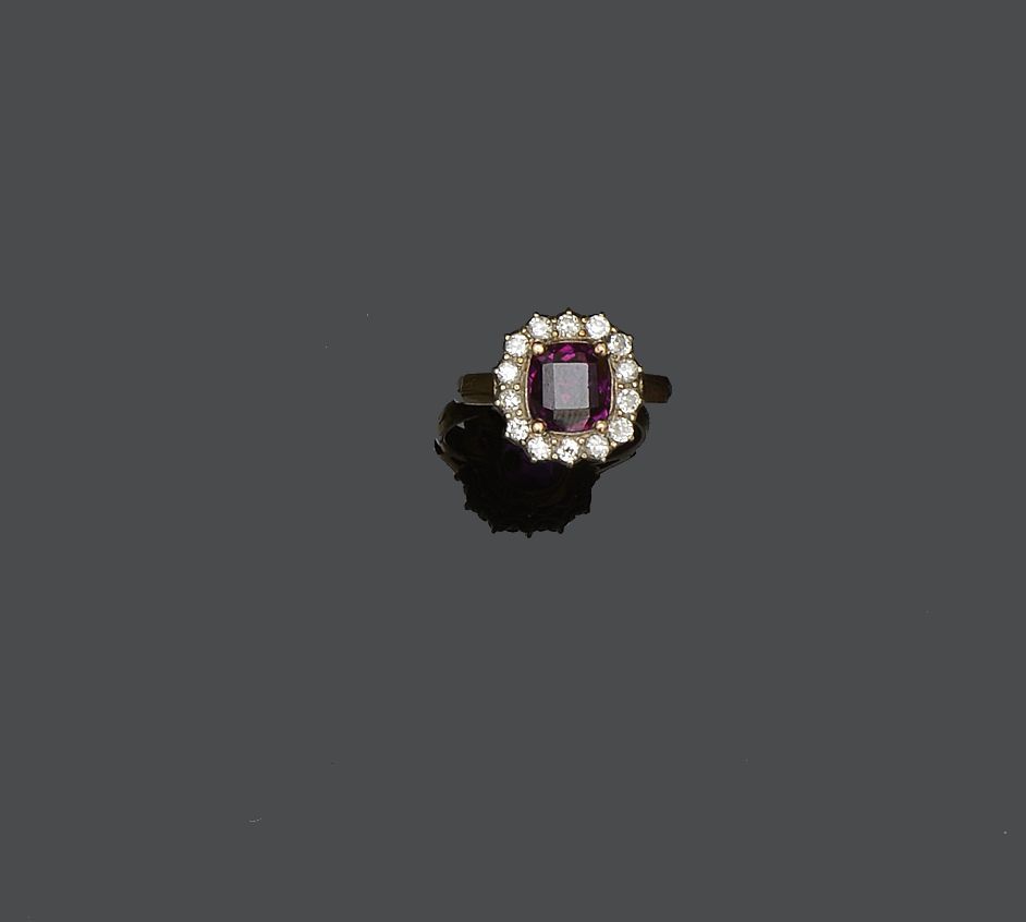 A ruby and diamond cluster ring