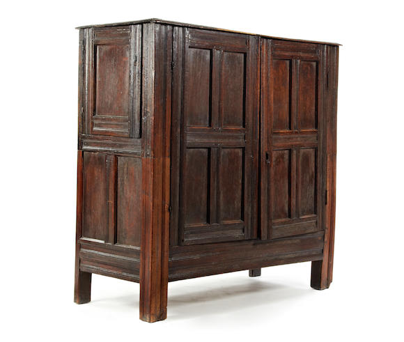 Bonhams : An oak joined panelled cupboard Constructed principally from