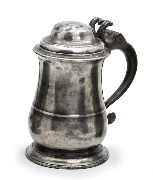 Bonhams : A mid-18th century dome-lidded pewter tankard, circa 1760