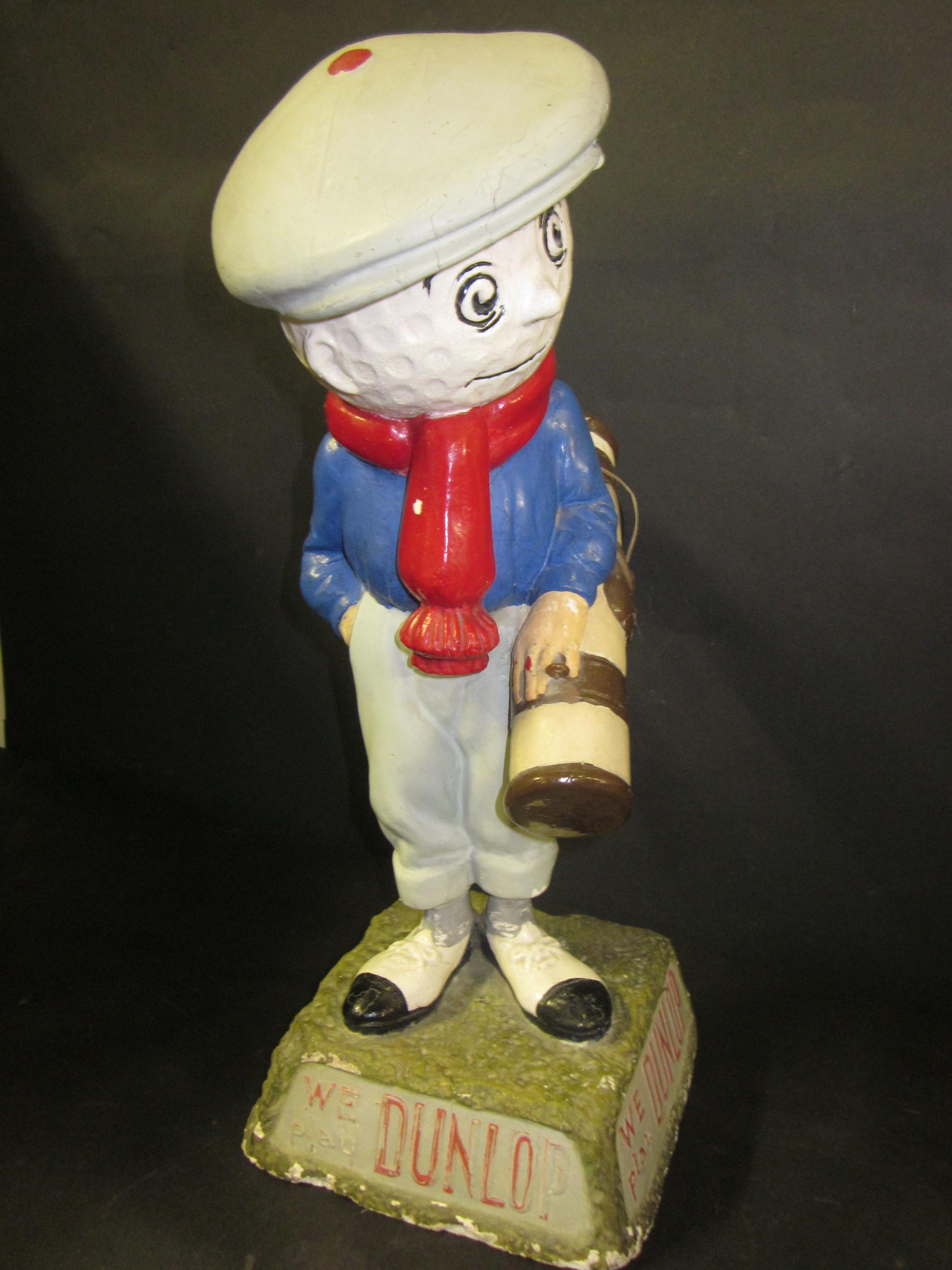 Bonhams : A very rare small Dunlop 65 Caddie point of sale figurine