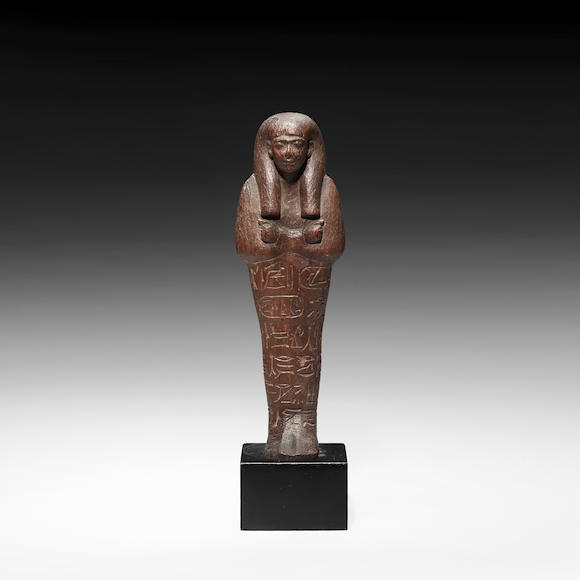 Bonhams : An Egyptian royal wood shabti of Seti I