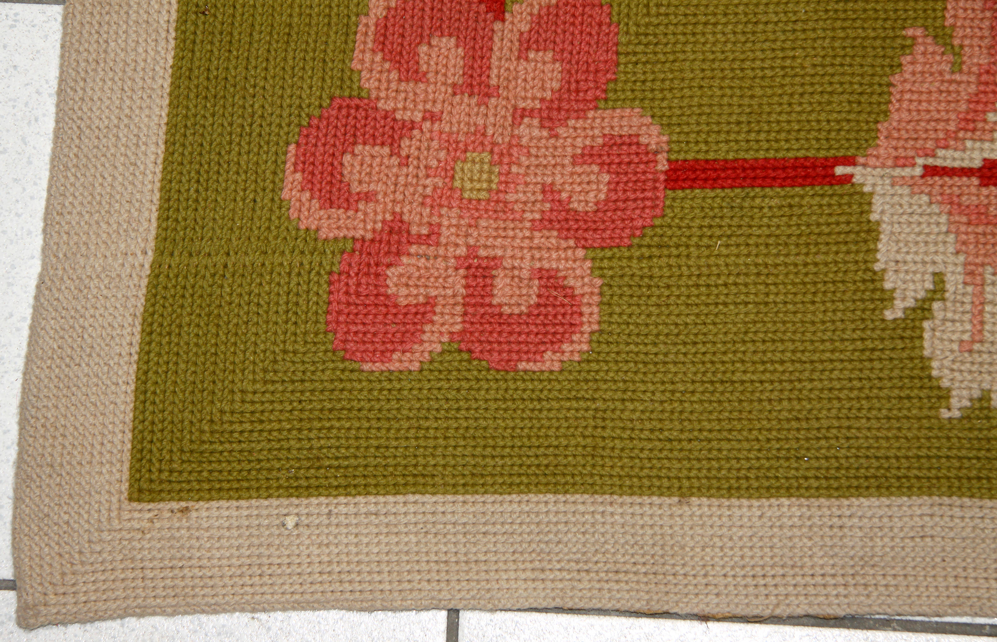A Large Pontremoli needlework carpet, C20th