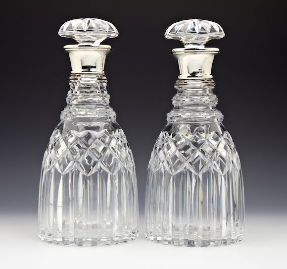 Bonhams A pair of silver collar glass decanters London 1935
