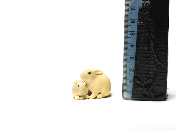 Bonhams : A rare ivory netsuke of a rabbit and young By Kagetoshi, 19th ...