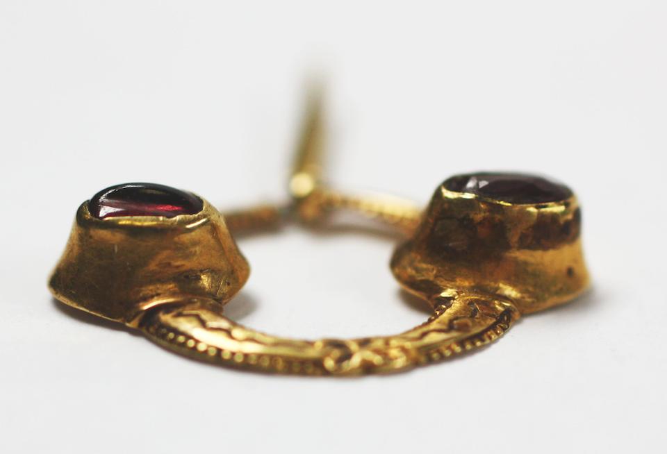 Bonhams : A gold and gem set buckle, circa 13th/14th century
