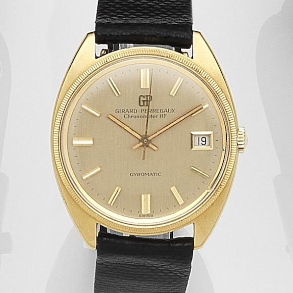 Bonhams : Girard-Perregaux. An 18ct gold automatic calendar wristwatch ...