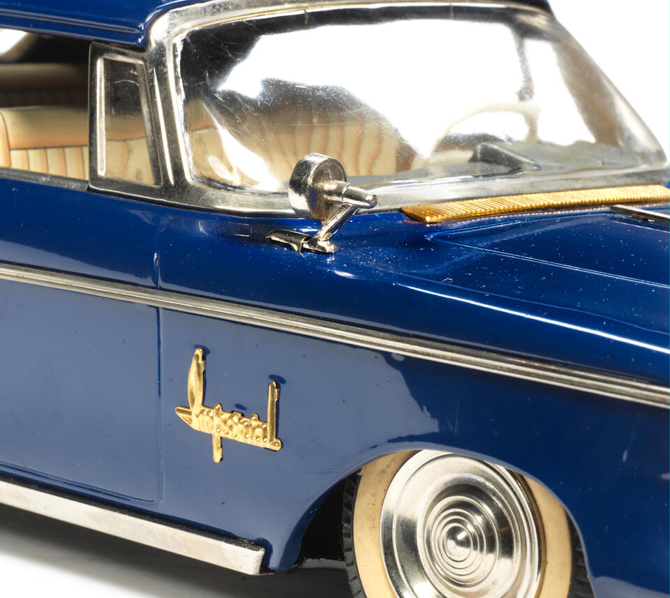 Bonhams Asahi Toy Co a rare boxed tinplate Chrysler Imperial toy car, 1962