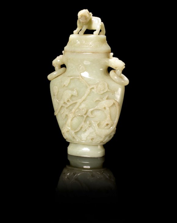 Bonhams A green jade vase and cover 20th century