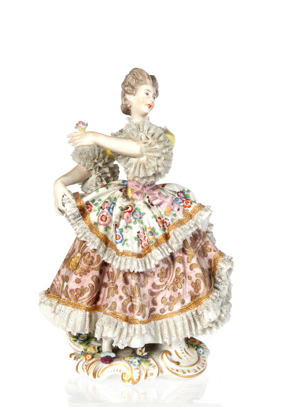 Bonhams : A Sitzendorf porcelain crinoline lady holding a pink rose