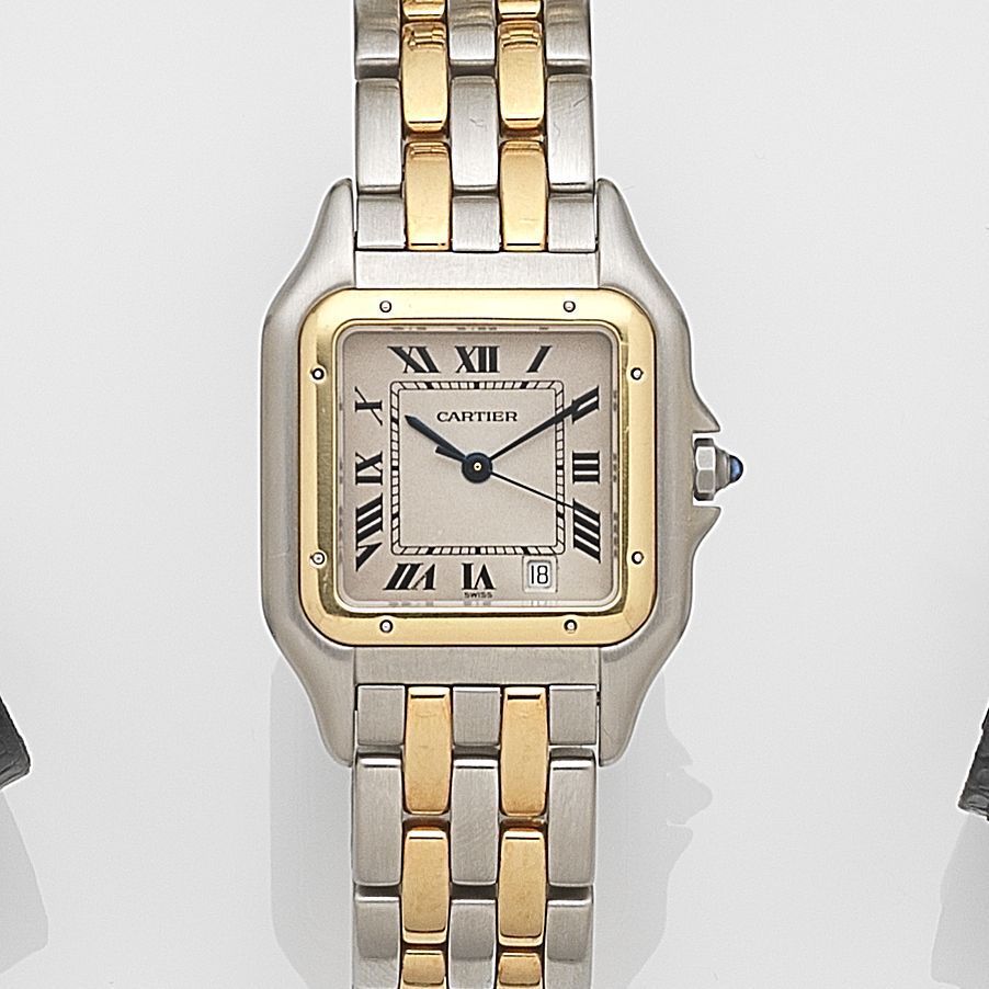 Bonhams A stainless steel and gold quartz calendar