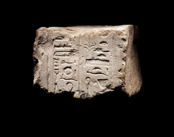 Bonhams : An Egyptian limestone double-sided relief fragment for Nefertiti