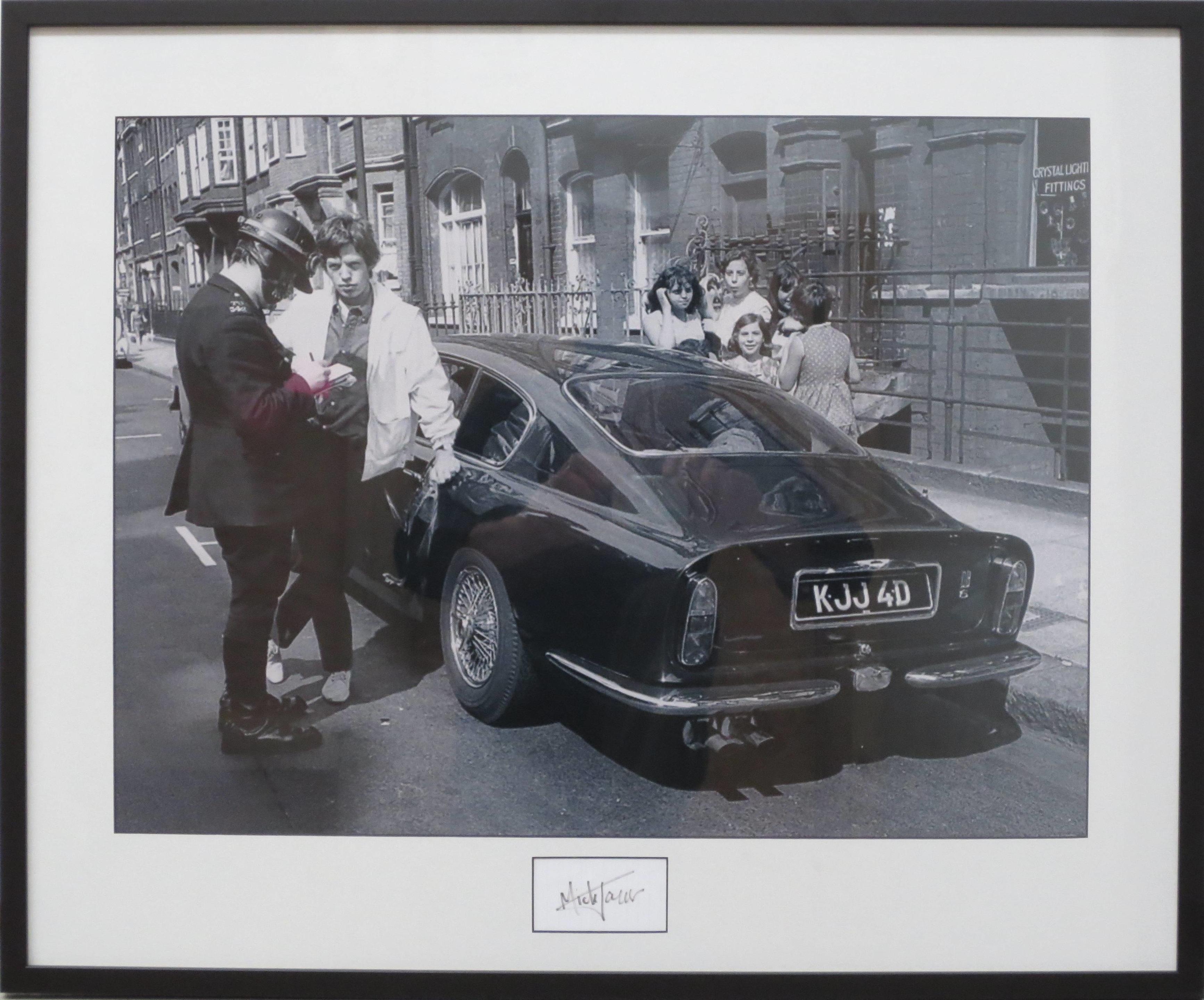 Bonhams Cars : A photograph of Mick Jagger and his Aston Martin DB6 ...