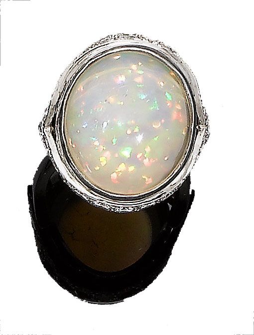 An opal and diamond ring