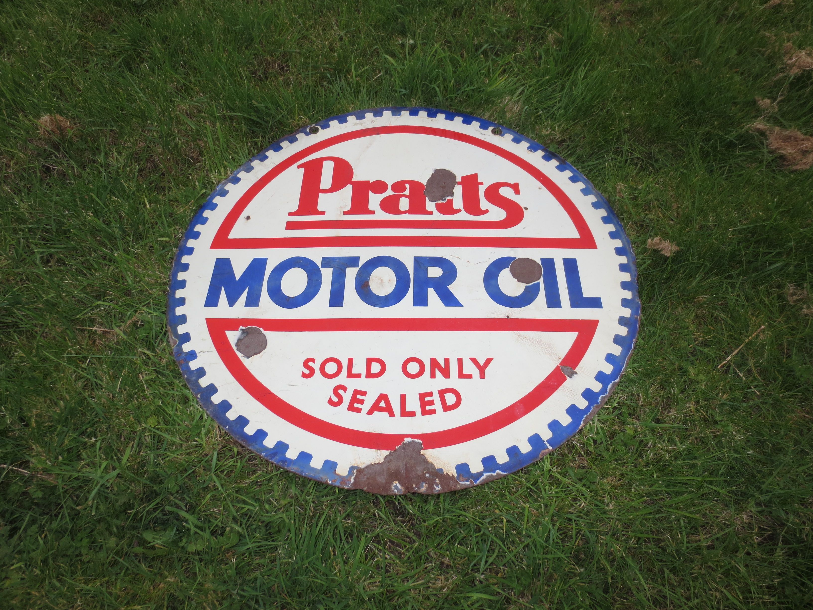 Bonhams Cars A Pratts Motor Oil enamel sign,