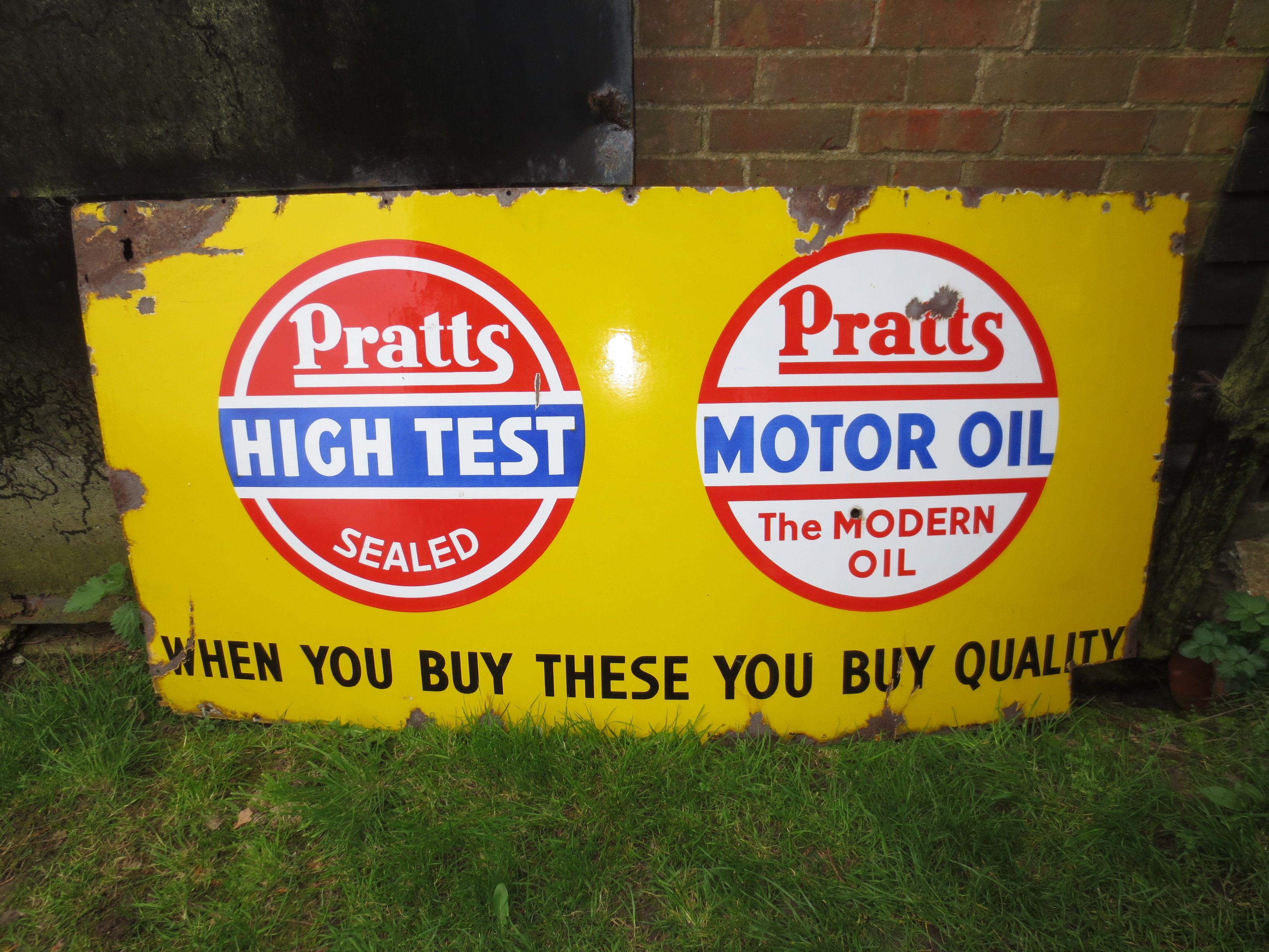 Bonhams Cars A large Pratts High Test and Pratts Motor Oil enamel sign,