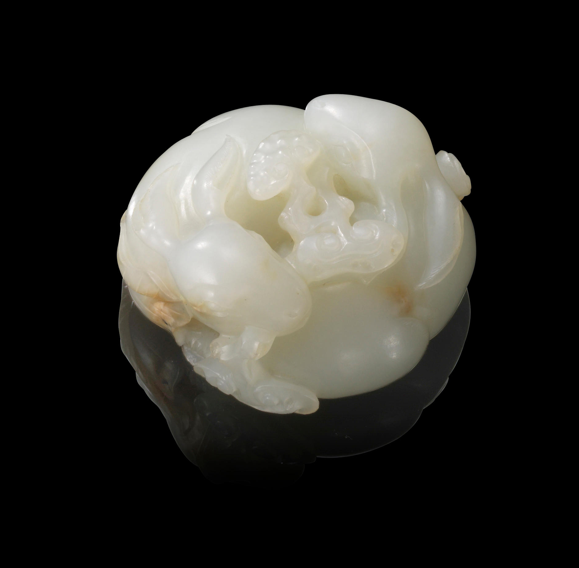 Bonhams : A white jade carving of recumbent rabbits Qing Dynasty